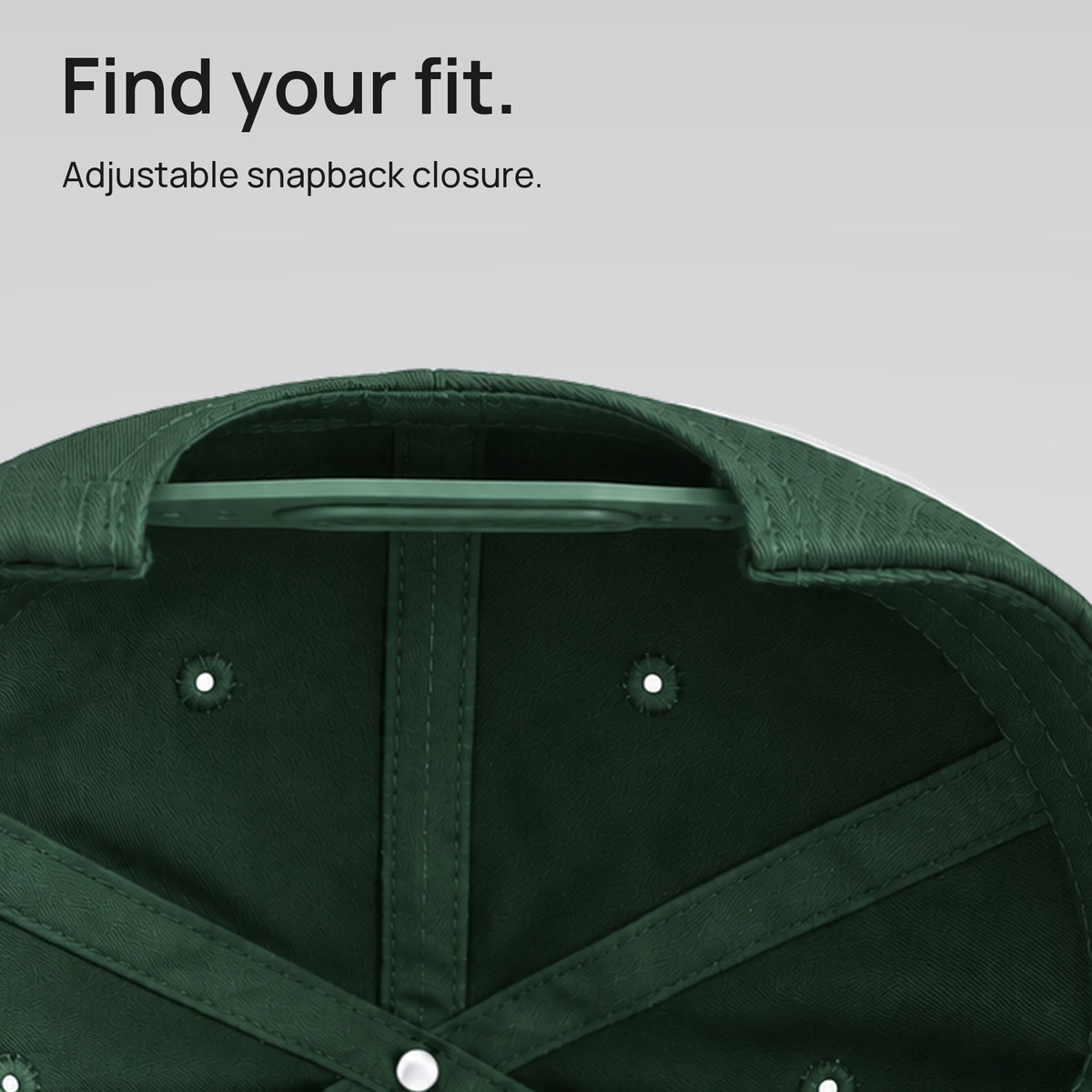 Close detail of the green DAD cap’s adjustable snapback closure. Find your fit.
