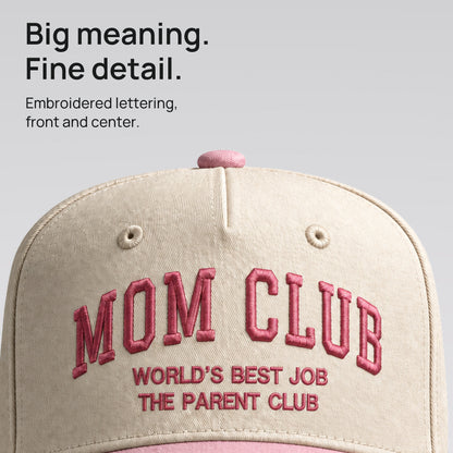 Close detail of pink Mom Club embroidery on cream cotton twill. Big meaning. Fine detail.