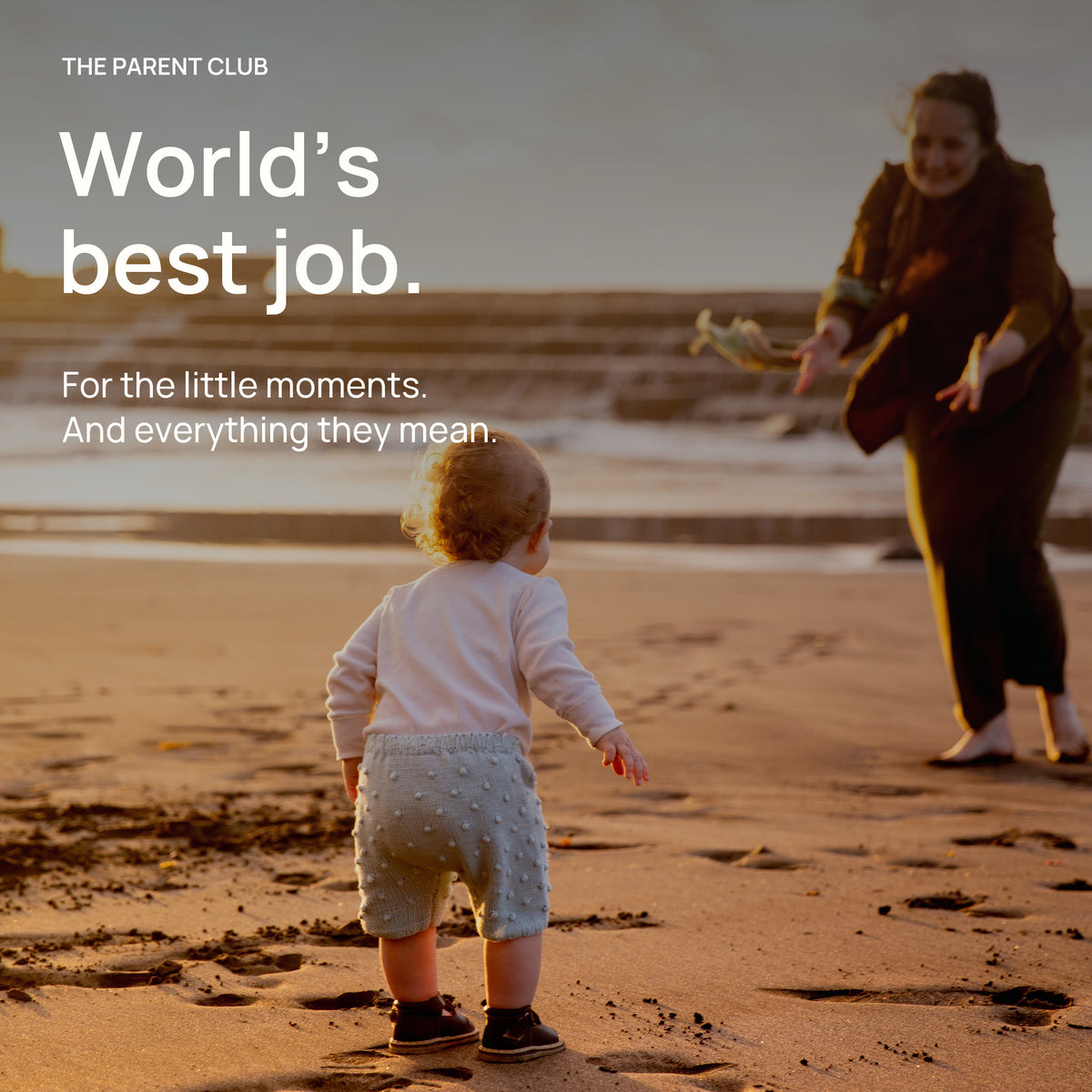 A mother welcomes her toddler on the beach. World’s best job. For the little moments and everything they mean.